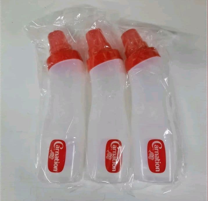 (3ชิ้น)ขวดบีบคาร์เนชั่น Carnation ฝาเกลียว แน่นหนาขนาดความจุ 750 ml ฝาขวดใช้ตวงได้ (1ฝา=60ml) (รับ5,700แต้ม)